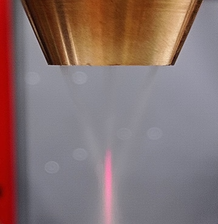 Laser cladding process. Positioning. Powder and laser beam focusing