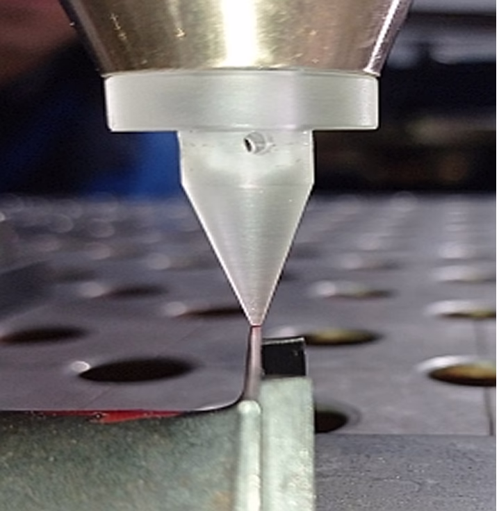 Laser cladding process. Positioning. Working point location on the part