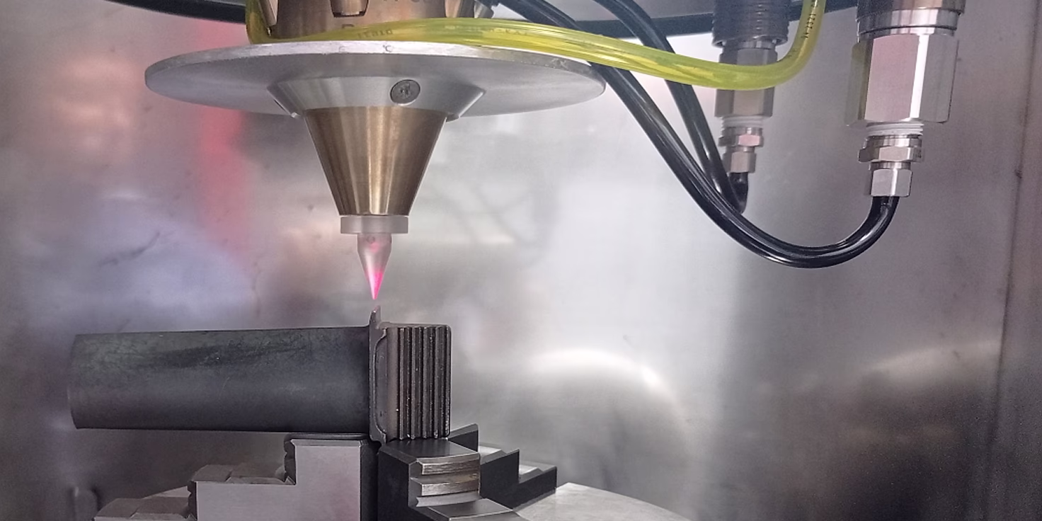 Laser cladding process. Positioning. Working point location inside controlled atmosphere chamber